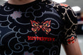 Black athletic shirt with butterfly design and 'ButterflyX' branding
